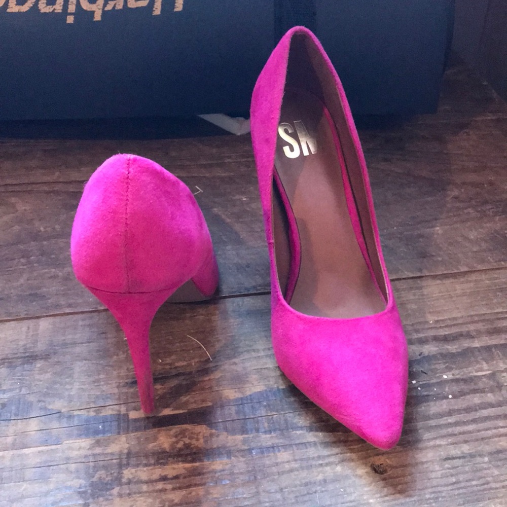 Hot pink suede pumps |